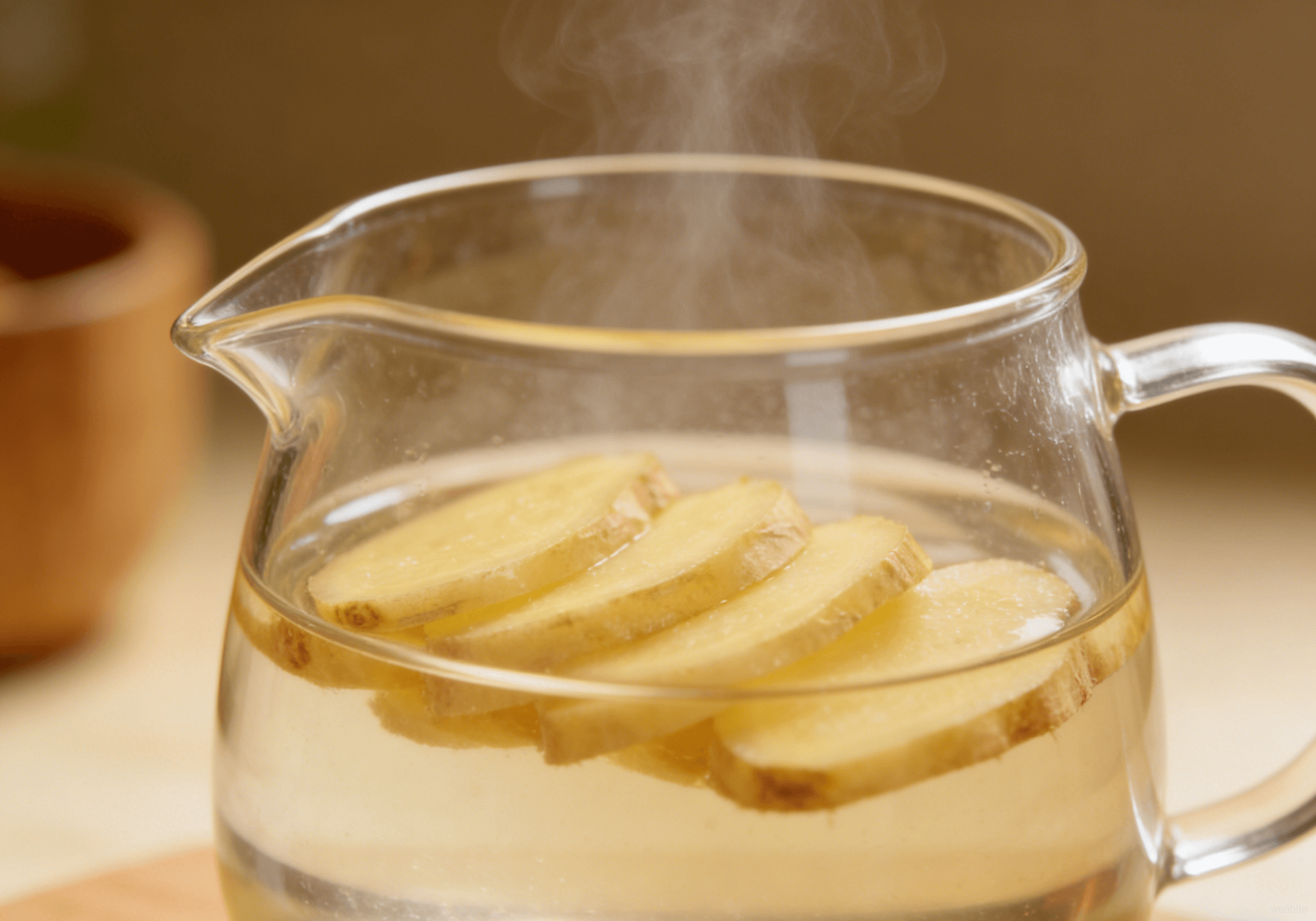 Ginger slices steeping in hot water